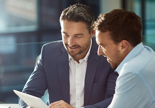 Two businessmen talking